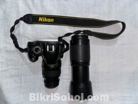 Nikon D3100 with 70-300mm zoom lens and 18-55mm kit lens